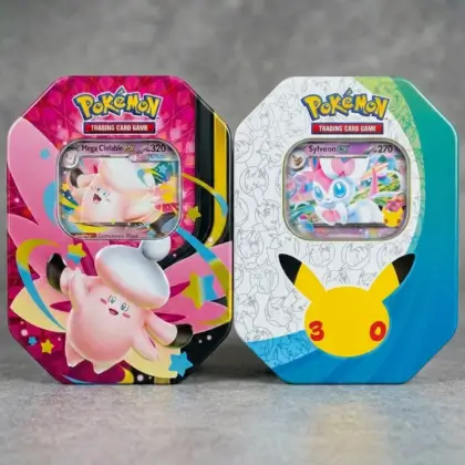 Apex_essentials_replace_the_tins_on_right_hand_side_of_pic_1_with_tins_in_pic__2_1aedb482-d926-4803-8a61-8d004ac29ccf Pokémon TCG 30th Celebration - ex Tin (Sylveon) & Mega Moonlit ex Tin ( Mega Clefable ) - Image 1